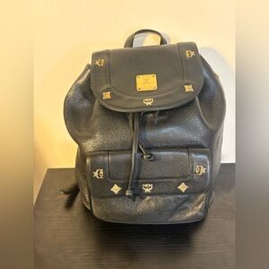 MCM Black Leather Backpack with Gold Accents and draw strings 12"x11"